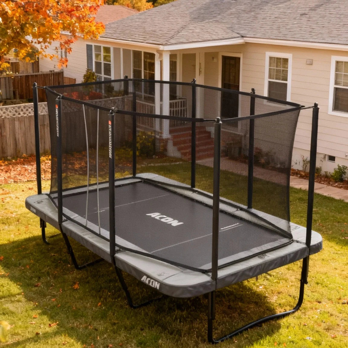 Acon HD 16 trampoline outdoors in a backyard in nice and cozy autumn weather. 