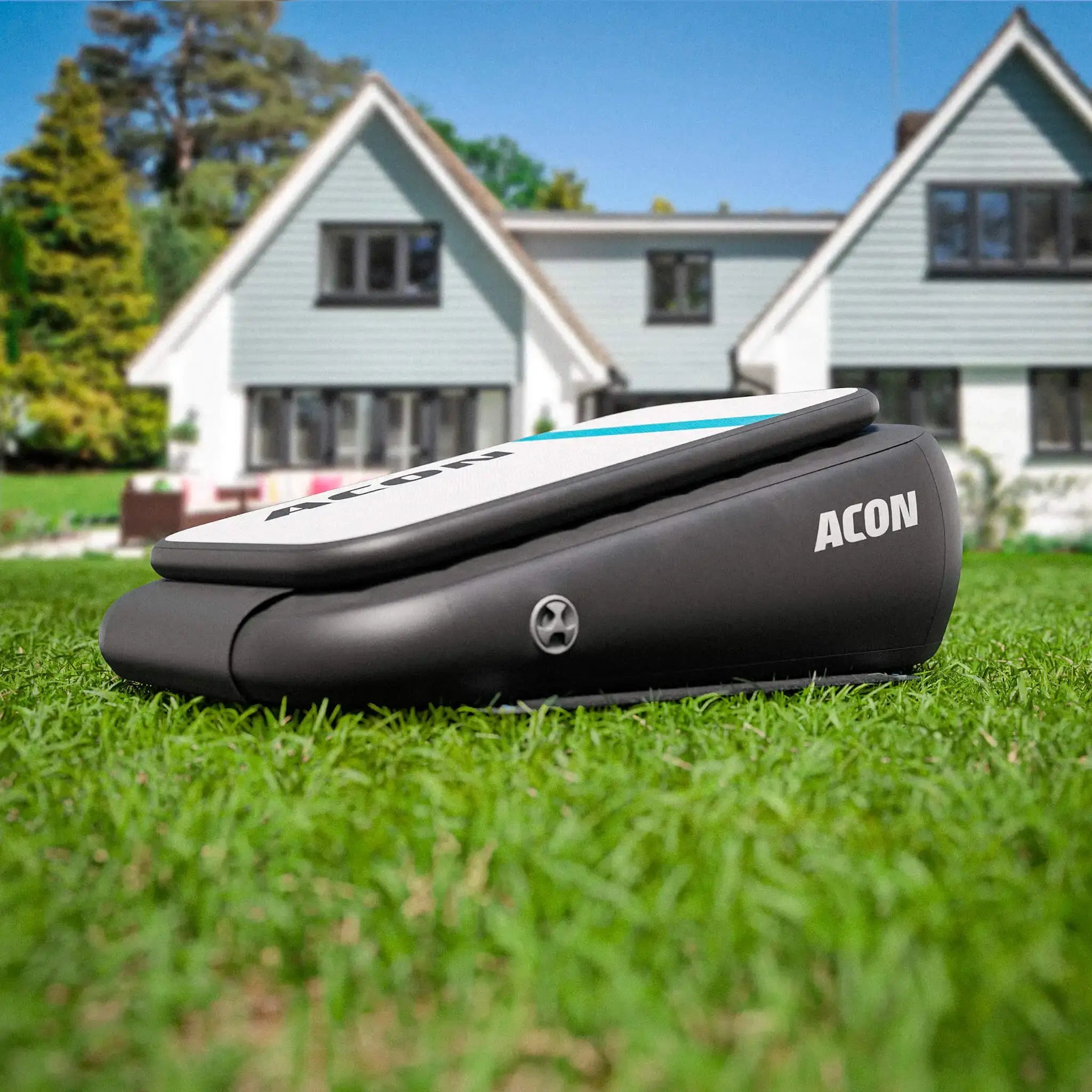 New Acon Airboard outside on the green grass. 
