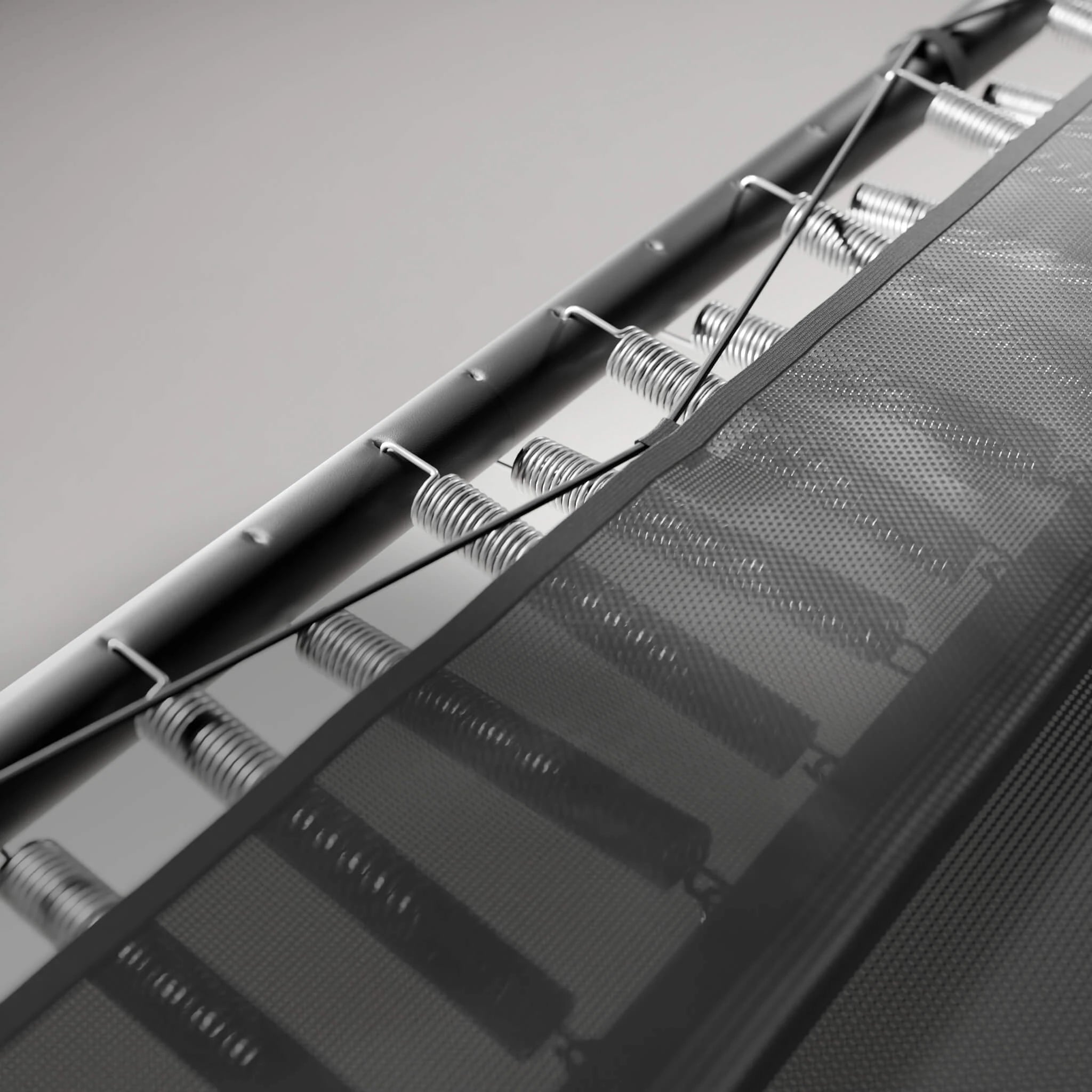Detail of the skirt covering the springs of the Acon 13 HD trampoline and the double-level springadjustment.