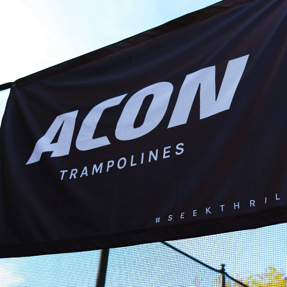 ACON Flag, Black close-up picture on a trampoline.