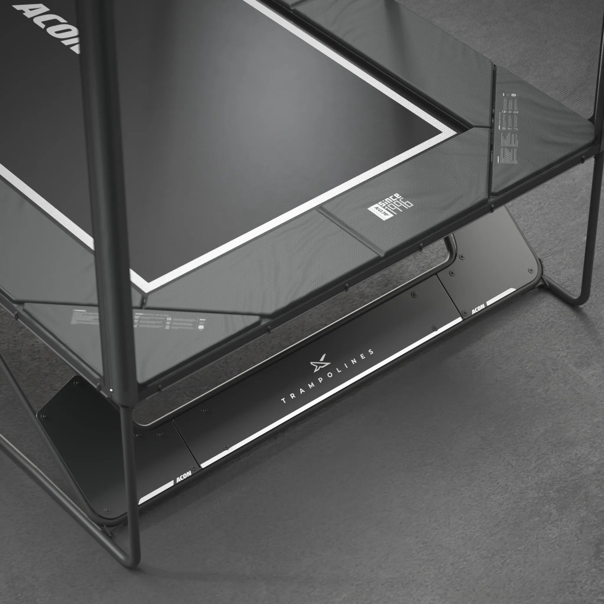 A detailed close-up of the Acon X 17ft trampoline showing the jump mat, thick safety padding, and the sturdy frame panel.