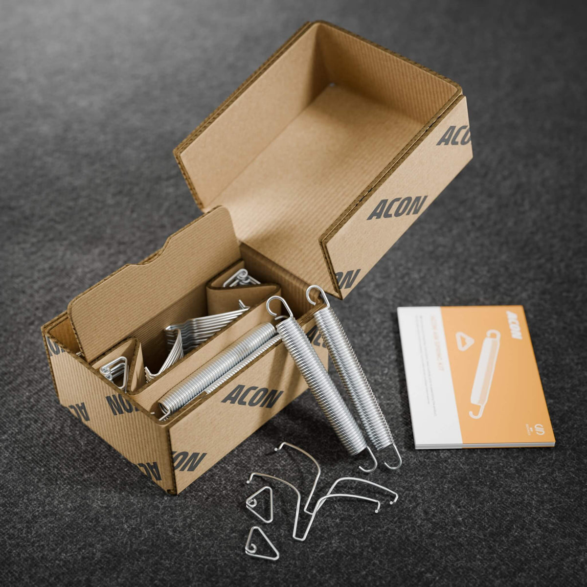 Acon Air Spring Kit box with full spring set. Includes everything needed to add more springs for safer, more stable bouncing. Learn more.