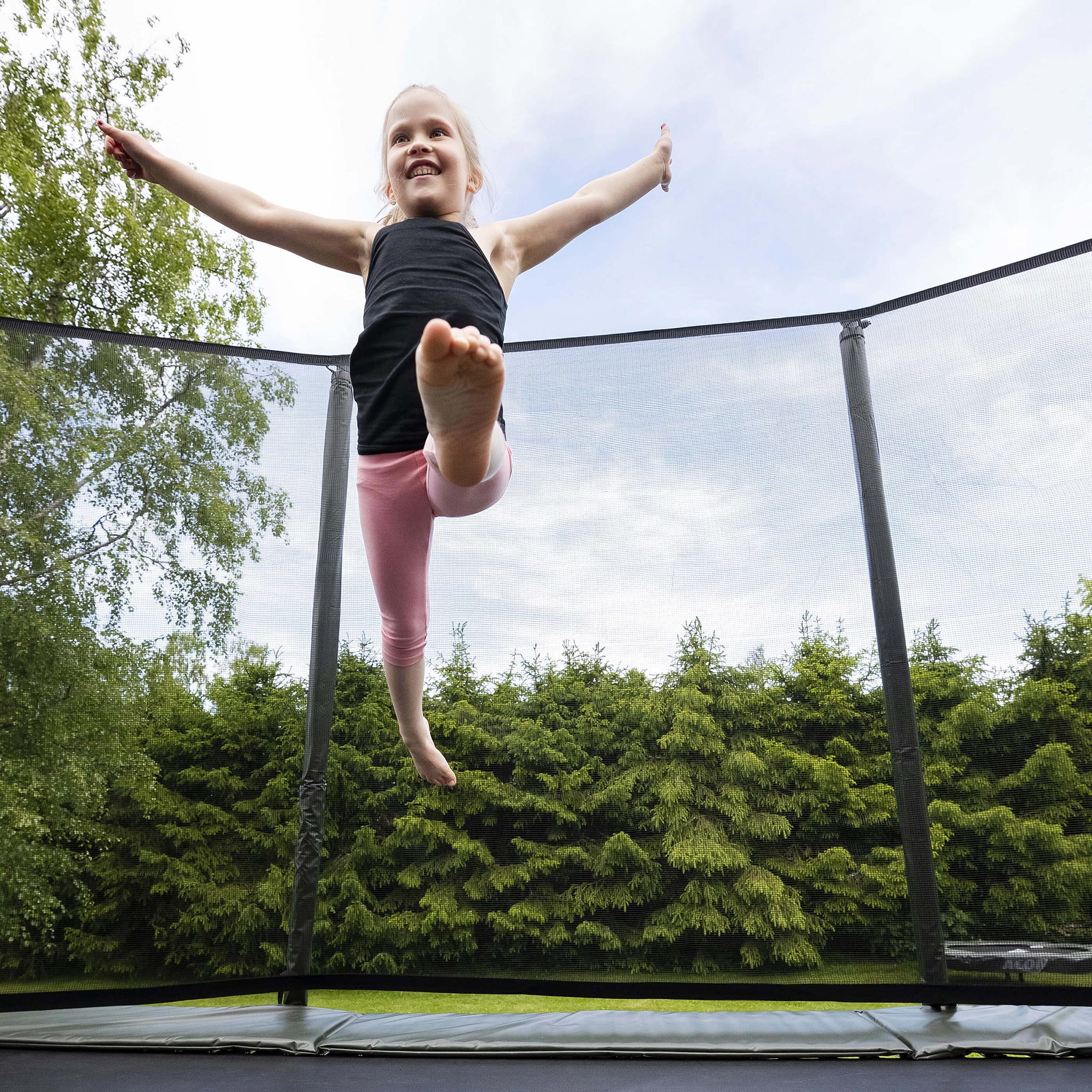 Girl jumps on an Acon HD trampoline.